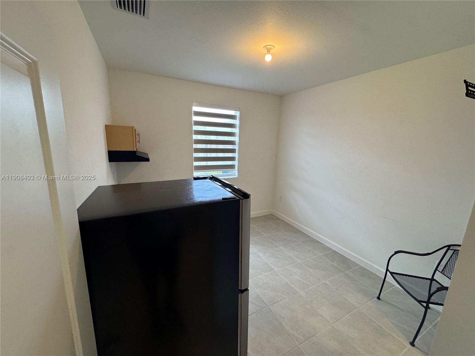 28850 Southwest 163rd Avenue, Unit 2 Homestead, FL 33033 - Photo 15 of 16 a view of entryway with workspace