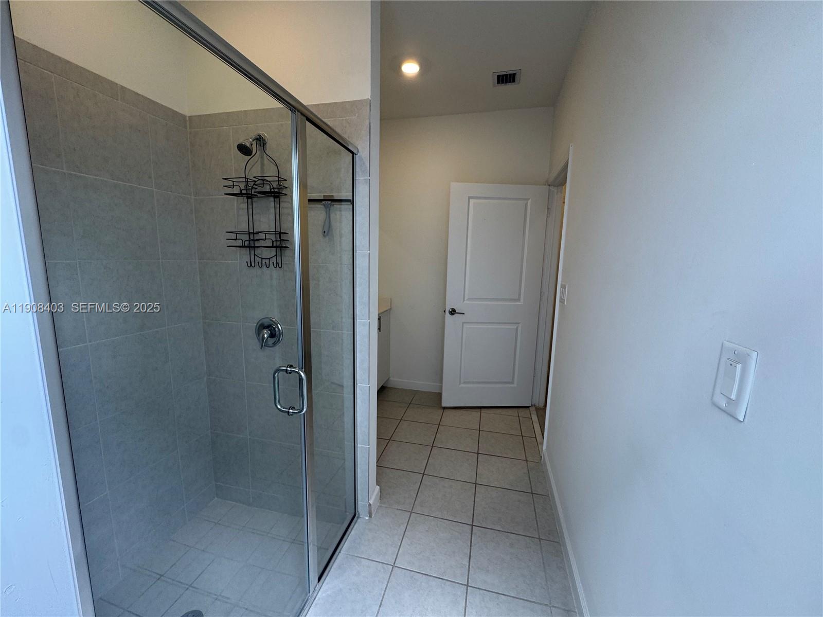 28850 Southwest 163rd Avenue, Unit 2 Homestead, FL 33033 - Photo 4 of 16 a bathroom with a shower