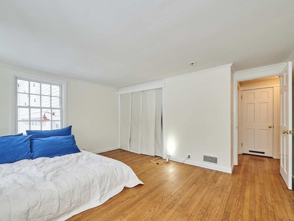 15 Giles Road Lincoln, MA 01773 - Photo 12 of 22 a bedroom with a bed and a window