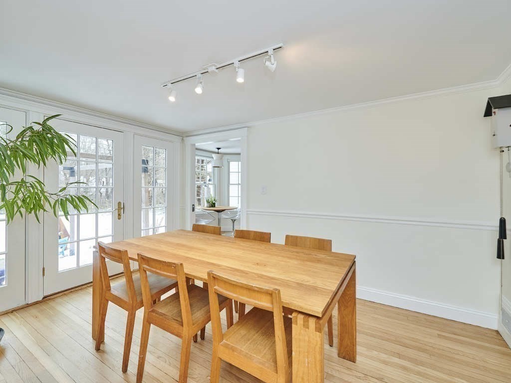 15 Giles Road Lincoln, MA 01773 - Photo 8 of 22 a dining room with furniture and wooden floor