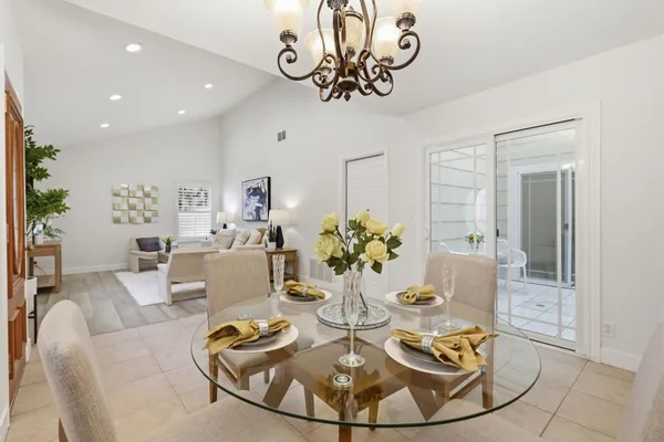 a view of a dining room with furniture