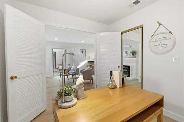 a very nice looking dining room with a table and chairs