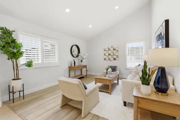 a living room with furniture and window