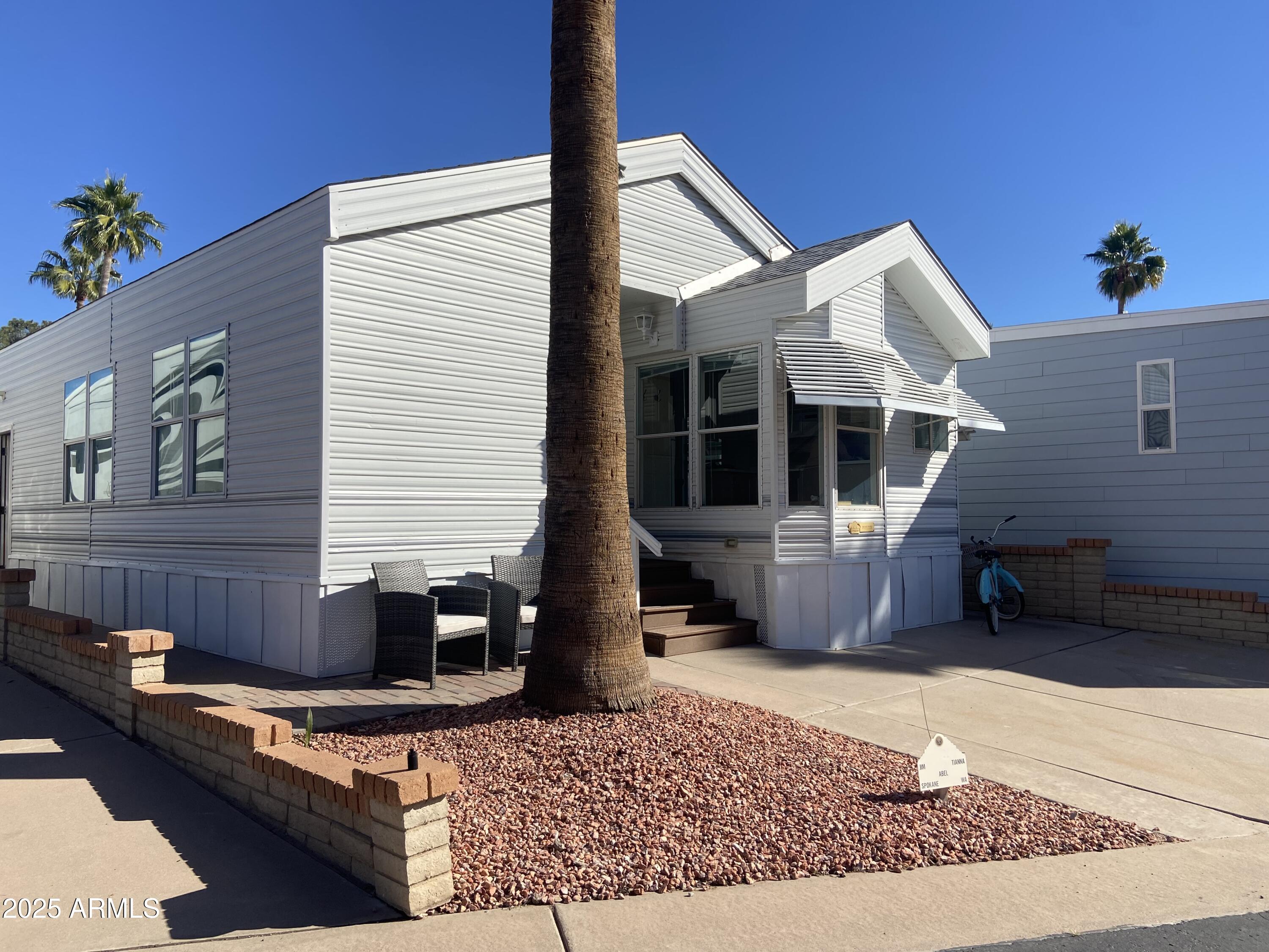 2128 South Dakota Avenue Apache Junction, AZ 85119 - Photo 1 of 36 a front view of a house with windows