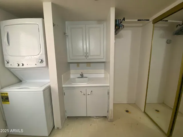 a view of bathroom with a sink and a washer