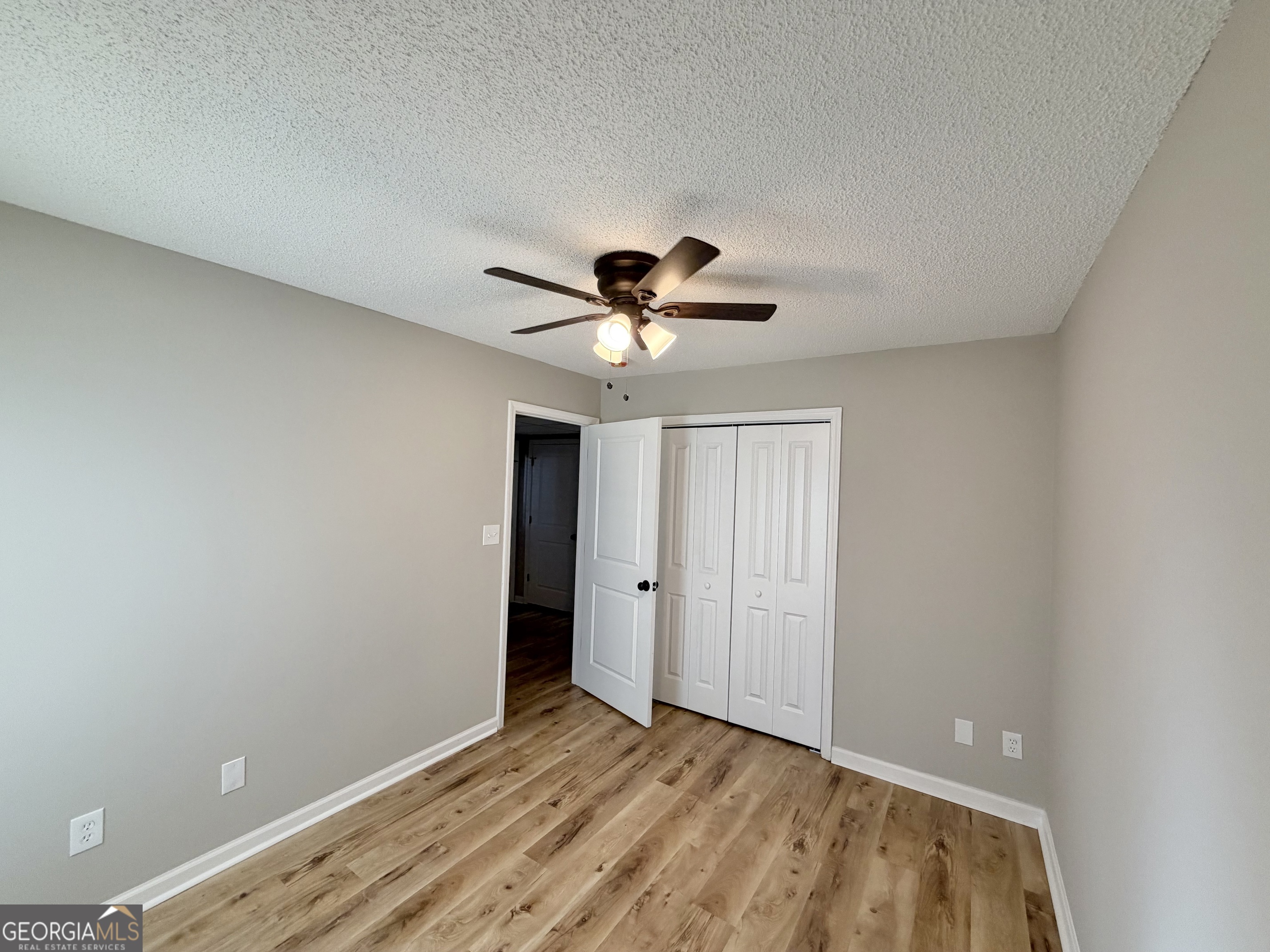 1610 Lance Drive Dublin, GA 31021 - Photo 38 of 46 a view of empty room with wooden floor