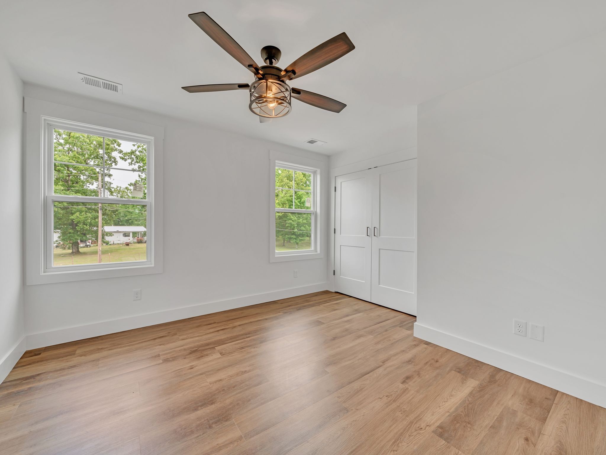 5800 Sanders Road Lyles, TN 37098 - Photo 17 of 28 a view of an empty room with wooden floor and a window