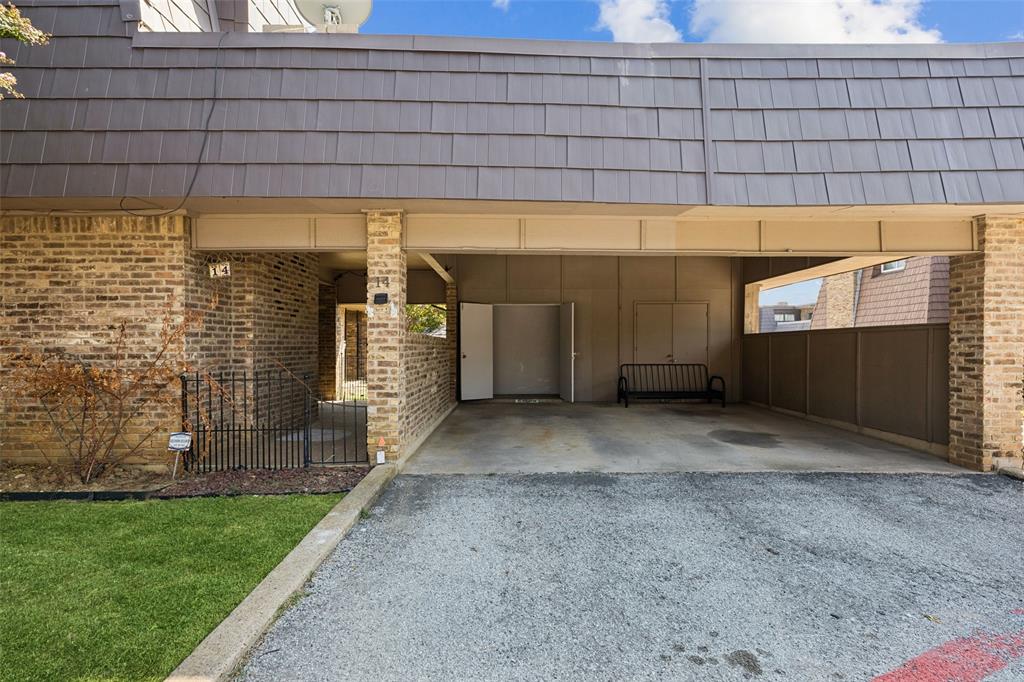 207 East Harwood Road, Unit 14 Euless, TX 76039 - Photo 2 of 28 a view of a garage