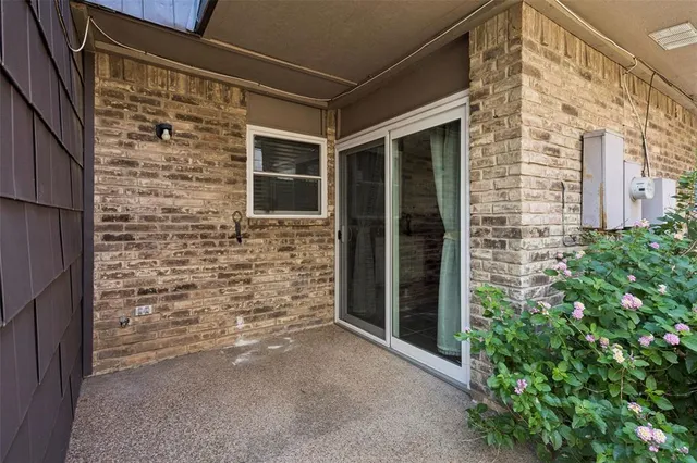 a view of front door of house with yard