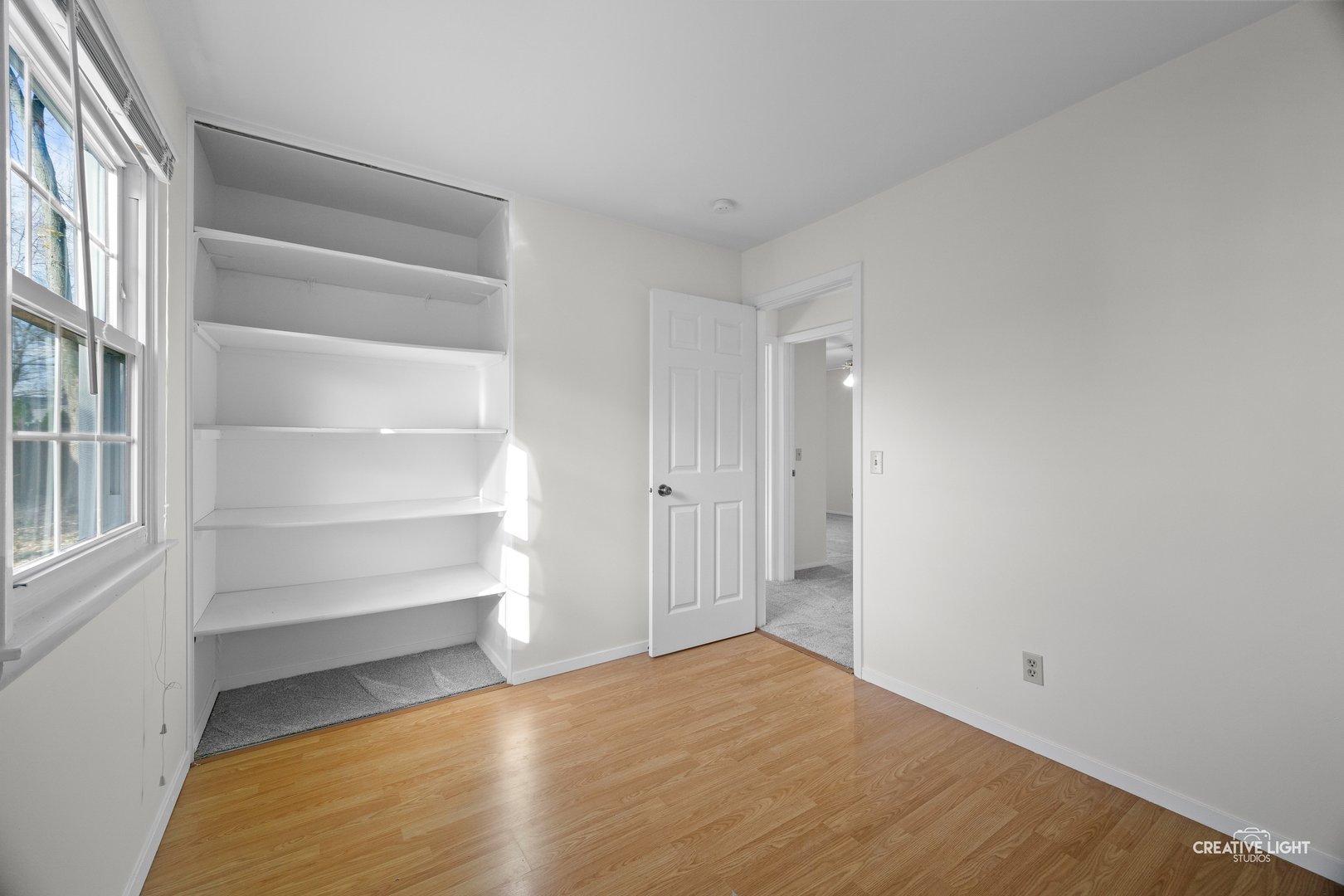 63 Saugatuck Road Montgomery, IL 60538 - Photo 14 of 25 a view of an empty room with a window