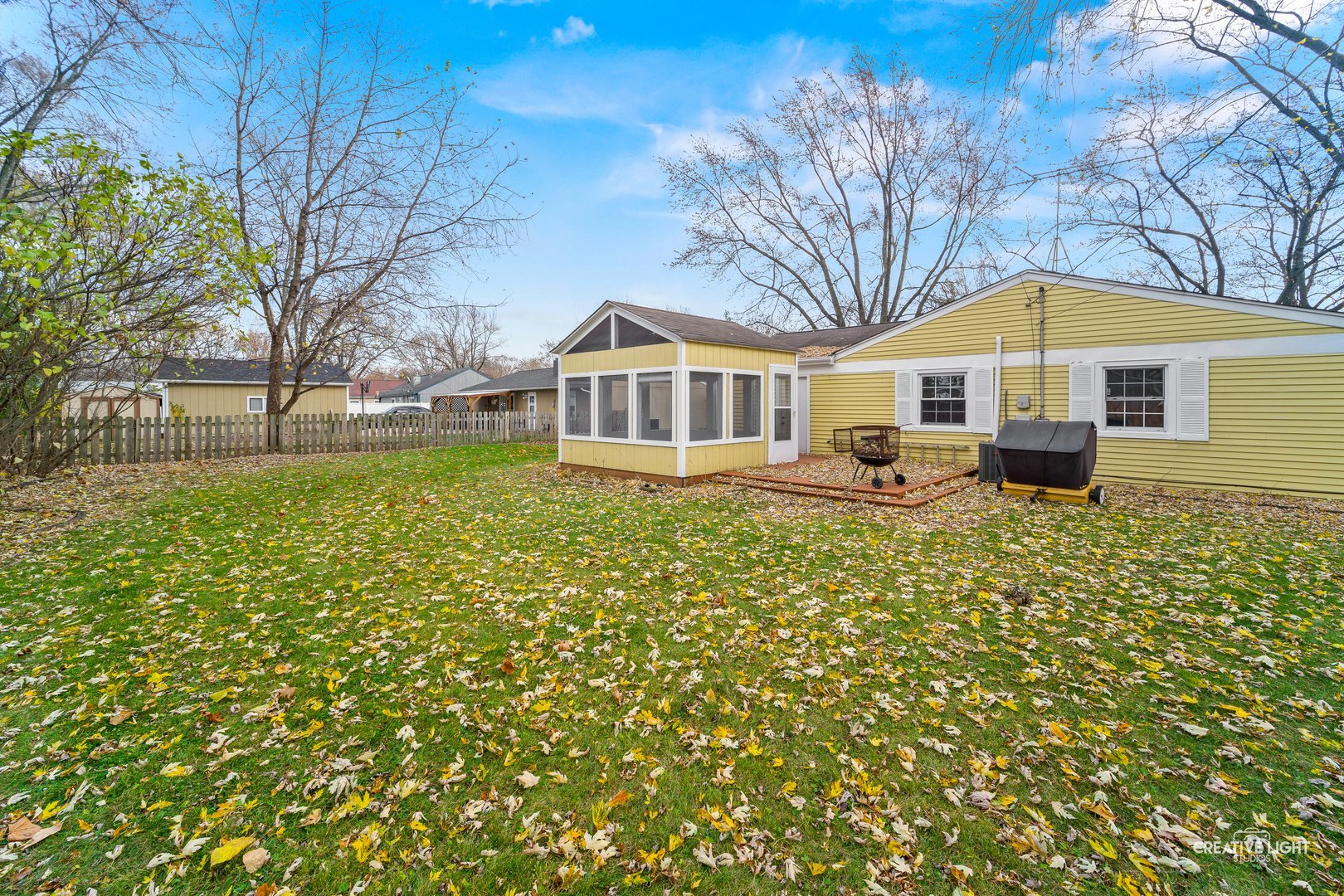 63 Saugatuck Road Montgomery, IL 60538 - Photo 22 of 25 a front view of a house with garden