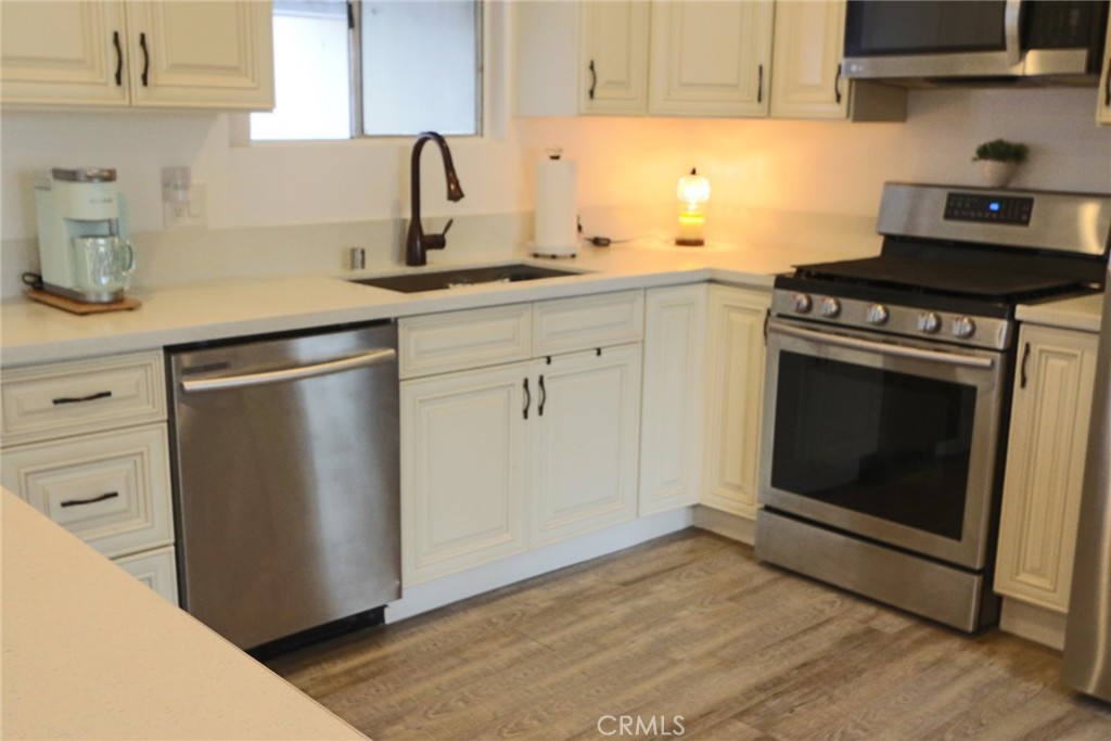 18540 Soledad Canyon Road, Unit 38 Canyon Country, CA 91351 - Photo 6 of 43 Wood Laminate Flooring throughout