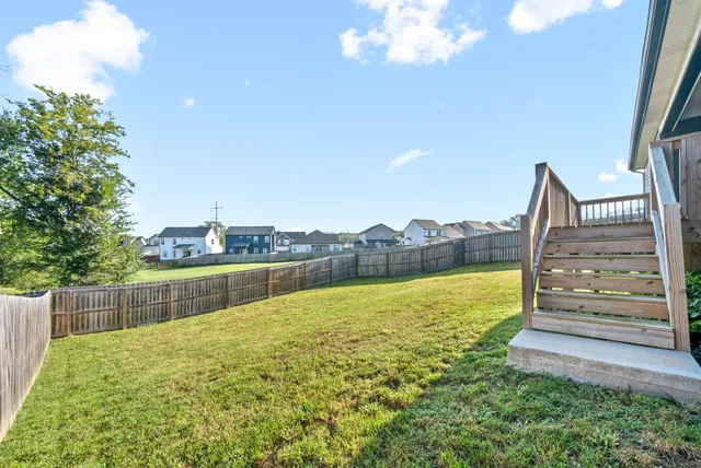 a view of a balcony with an ocean view