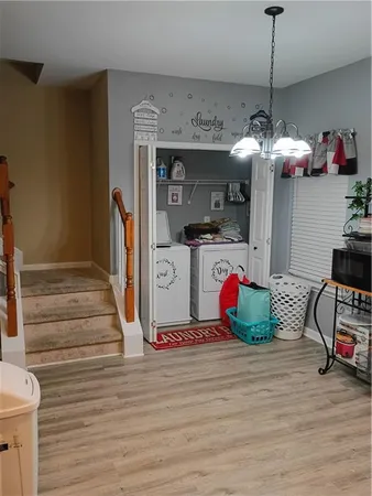 a room with furniture and wooden floor