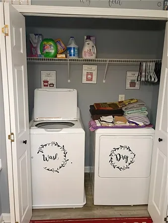 a kitchen with a stove and a refrigerator