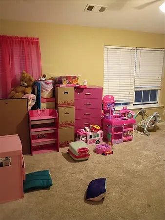 a room with toys and couches