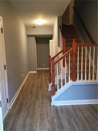 a view of entryway with wooden floor