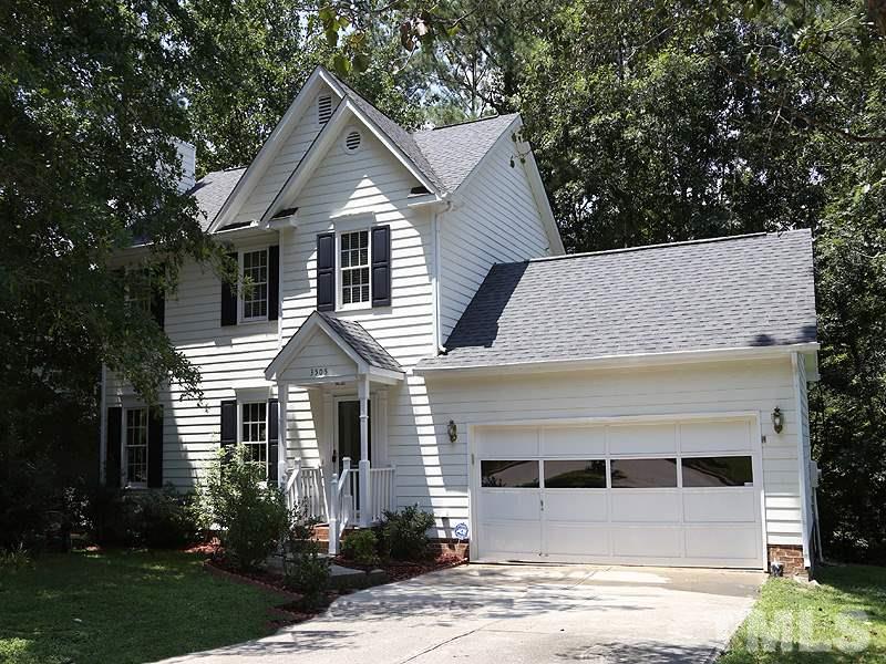 3505 Singleleaf Lane Raleigh, NC 27616 - Photo 1 of 14 front view of a house with a yard