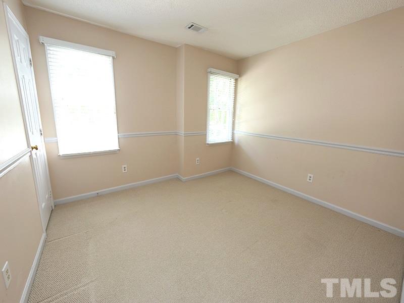 3505 Singleleaf Lane Raleigh, NC 27616 - Photo 8 of 14 an empty room with a window