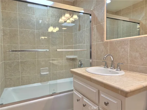 a bathroom with a sink toilet and vanity