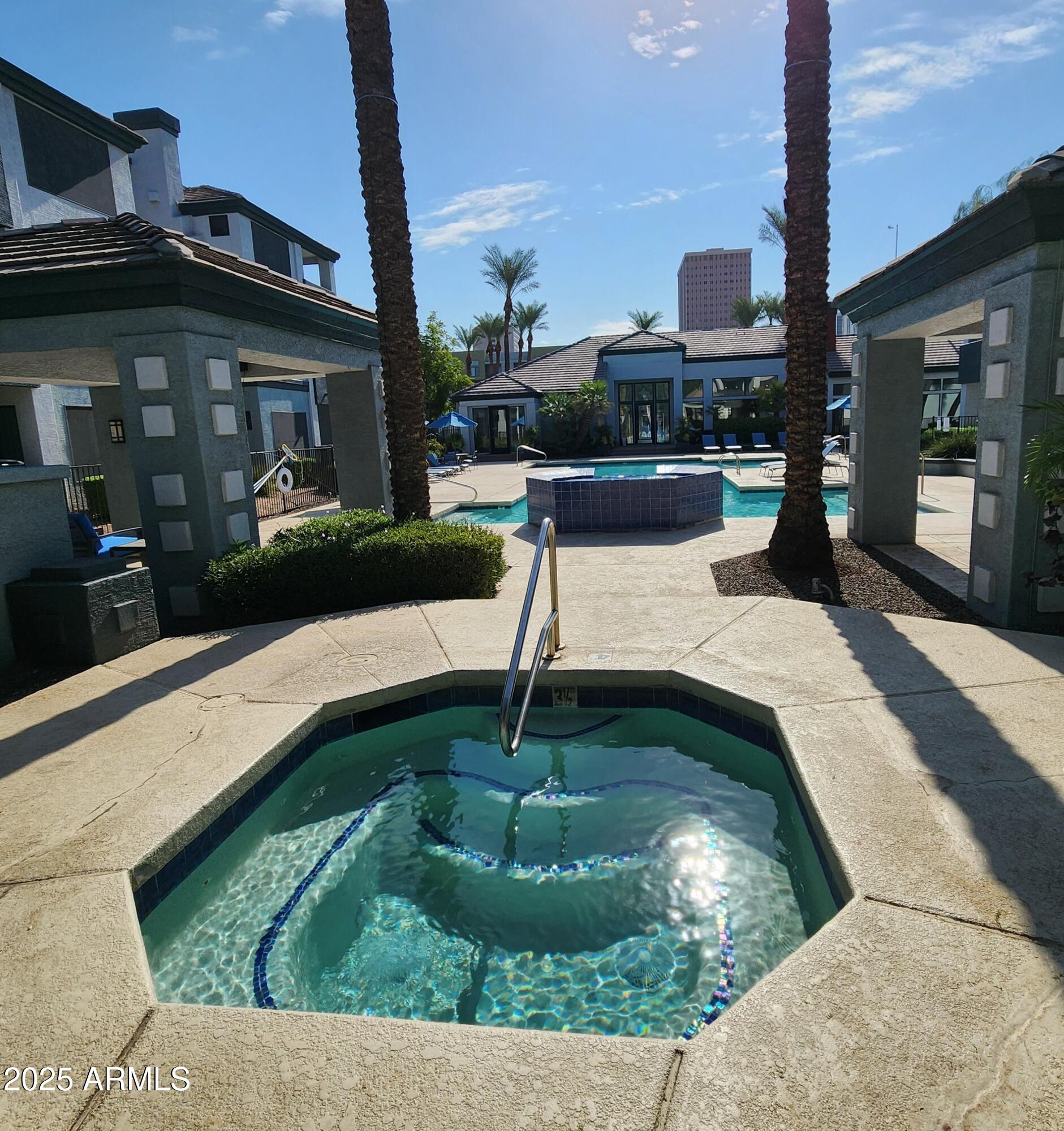3848 North 3rd Avenue, Unit 1044 Phoenix, AZ 85013 - Photo 13 of 22 a swimming pool with outdoor seating yard and barbeque oven
