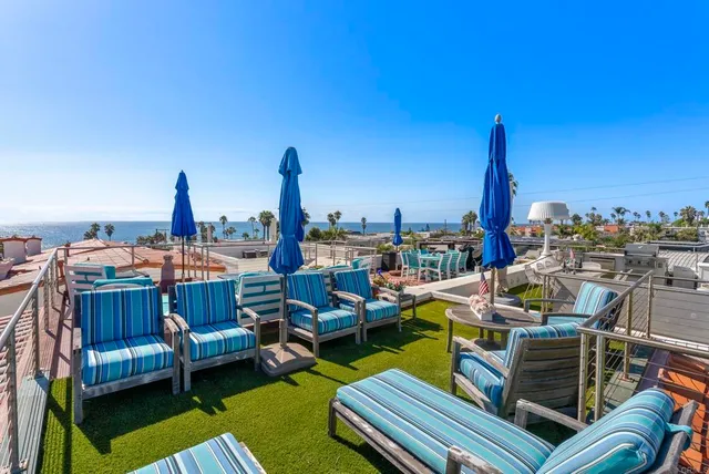 a view of a terrace with furniture