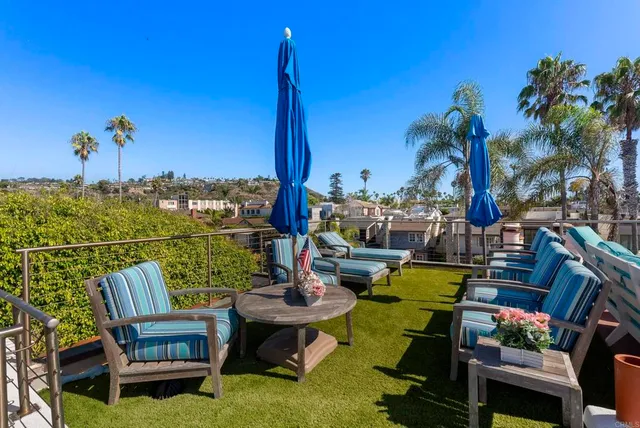 a view of a terrace with furniture