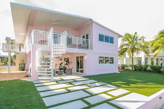 a view of a building with a yard