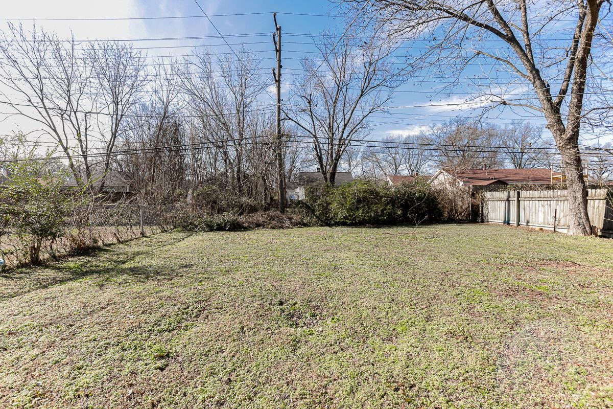 1023 Parkland Road Memphis, TN 38111 - Photo 13 of 13 a view of a yard with a house