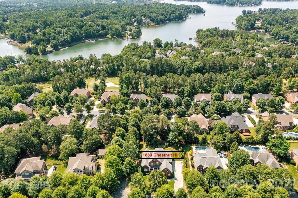1883 Chestnut Hill Drive Tega Cay, SC 29708 - Photo 2 of 34 an aerial view of residential house with outdoor space and trees around