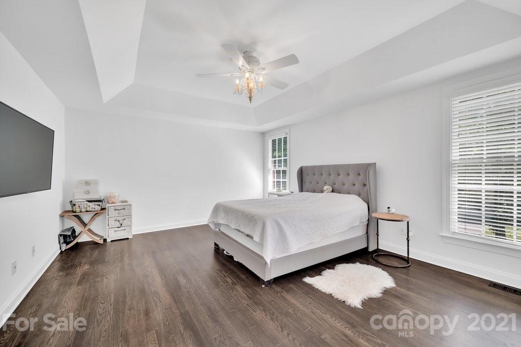 1883 Chestnut Hill Drive Tega Cay, SC 29708 - Photo 15 of 34 a bedroom with a bed and window