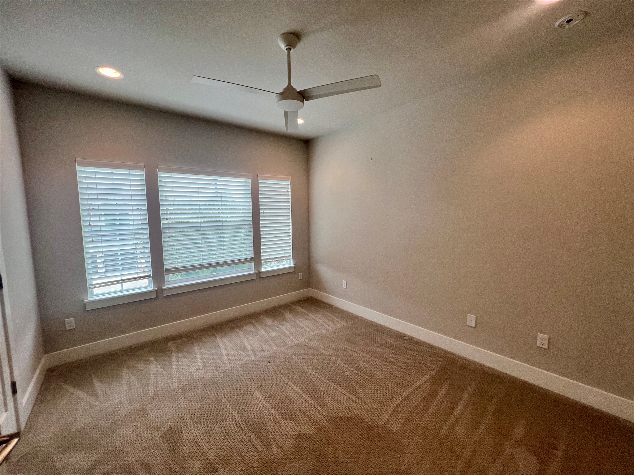6515 Davis Lane, Unit 10 Austin, TX 78749 - Photo 21 of 22 A quiet bedroom retreat with recessed lighting and a ceiling fan for year-round comfort.