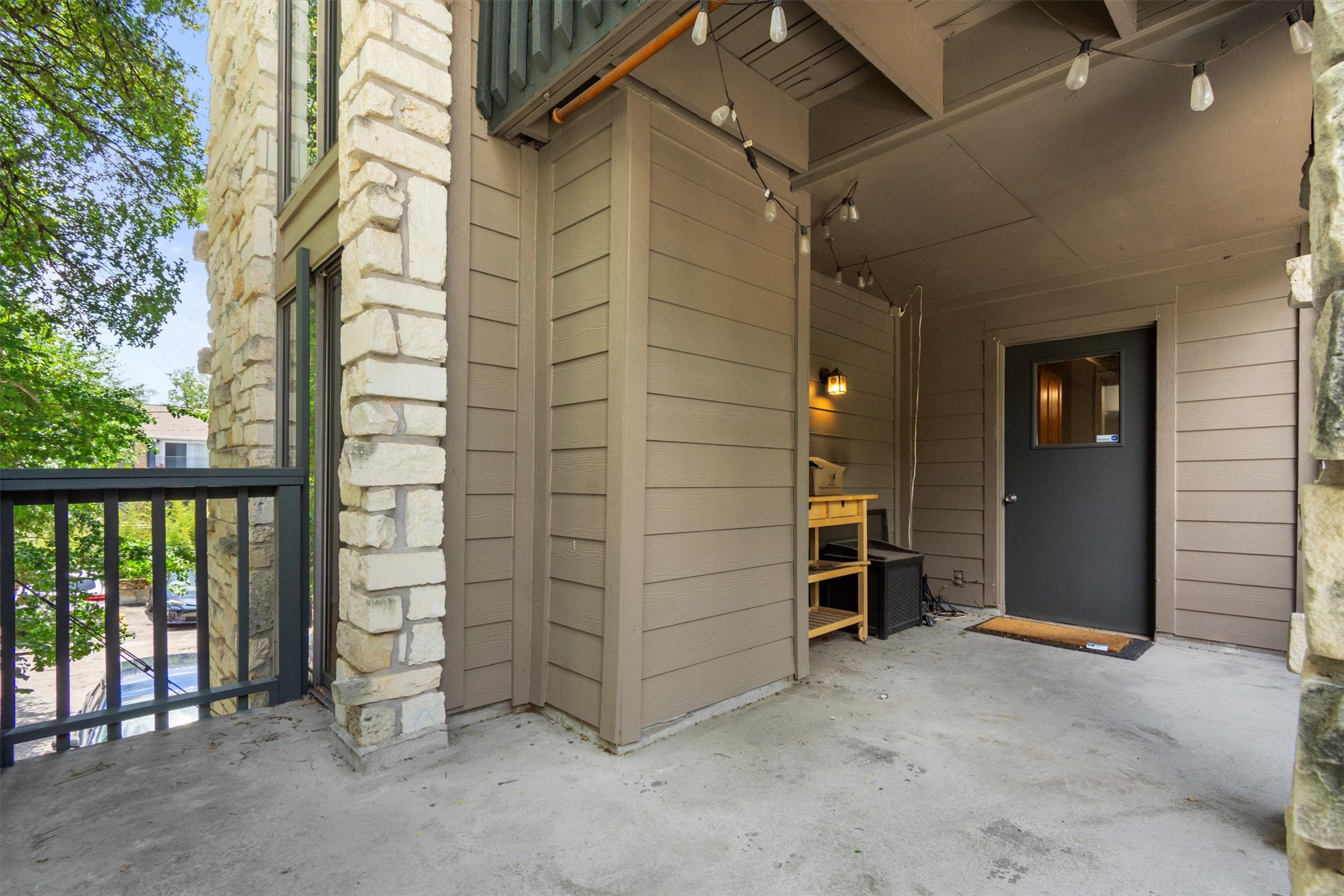 3627 Menchaca Road, Unit 204 Austin, TX 78704 - Photo 12 of 23 A spacious, uncovered patio provides an inviting outdoor area for relaxation.