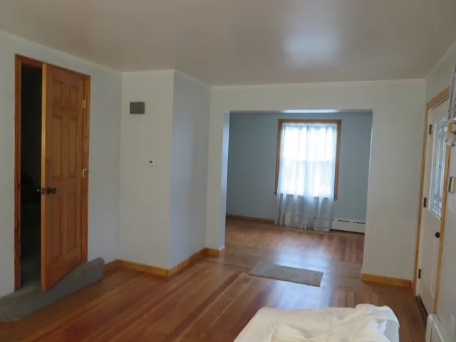 a view of livingroom with hardwood floor and window