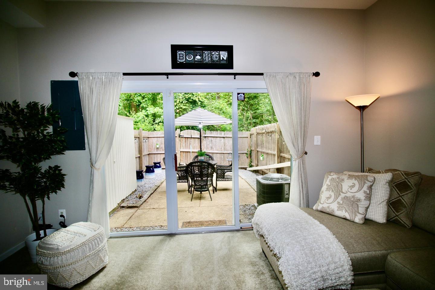 5918 Prince George Drive, Unit 313 Springfield, VA 22152 - Photo 17 of 29 a living room with furniture and a large window