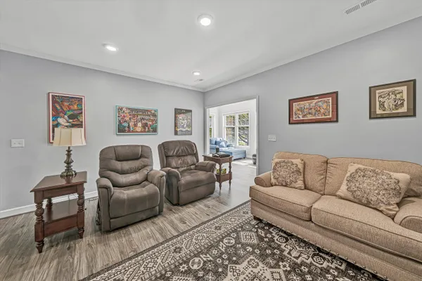 a living room with furniture and a couch