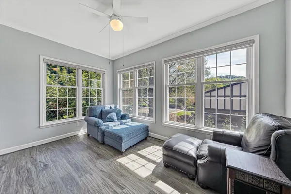 a living room with furniture and a window