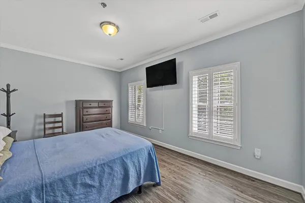 a bathroom with a glass shower door