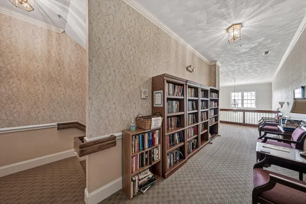 a view of a livingroom with furniture and front door