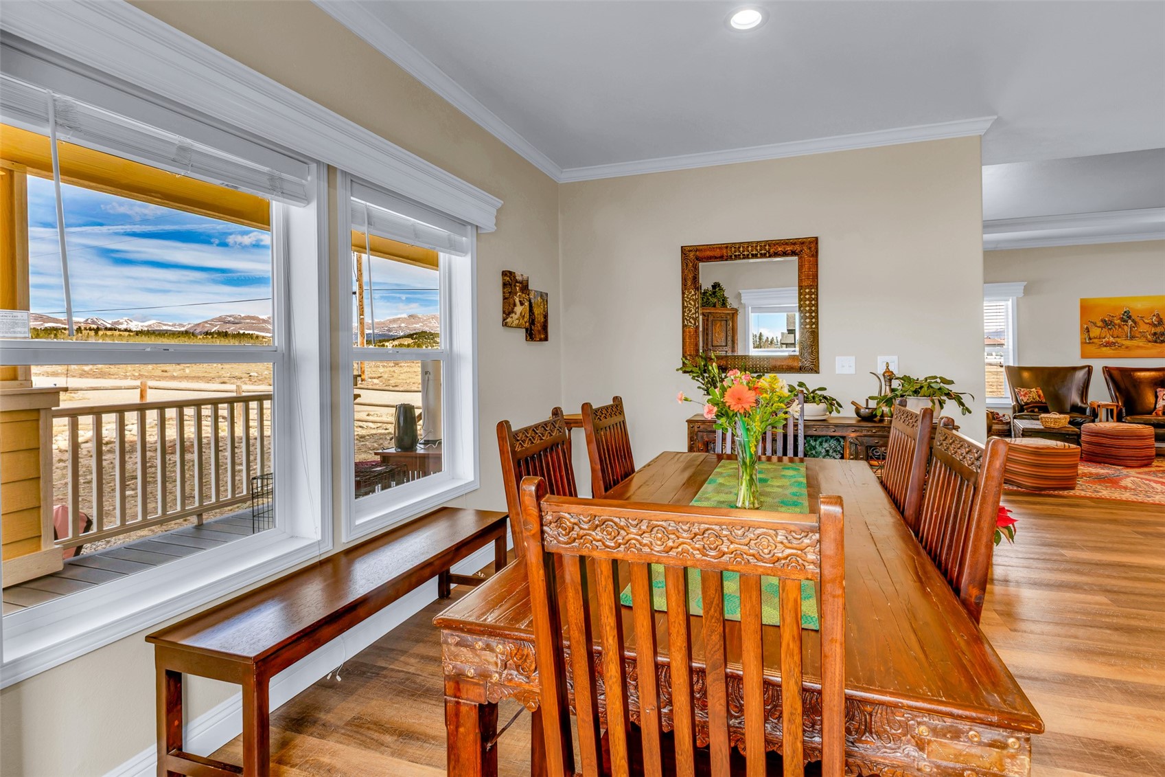 108 A Sun Rock Road, Unit A Fairplay, CO 80440 - Photo 8 of 48 a dining room with furniture a flat screen tv and a large window
