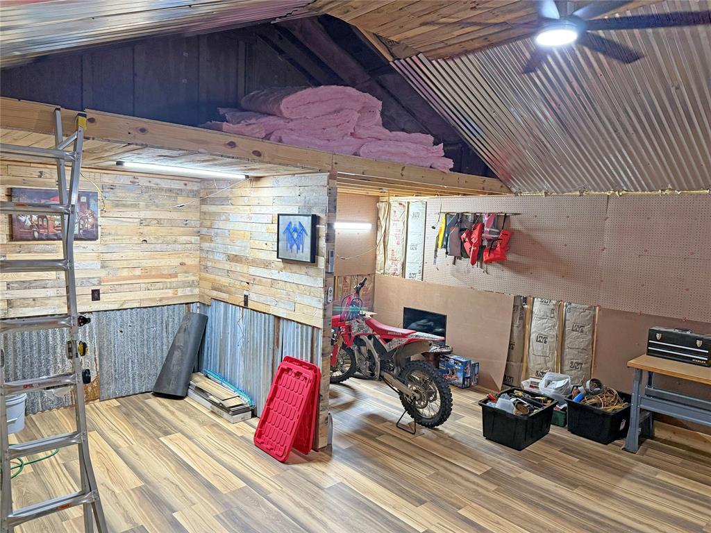 214 Destiny Lane Keatchie, LA 71046 - Photo 35 of 40 a view of a patio with table and chairs barbeque with wooden floor