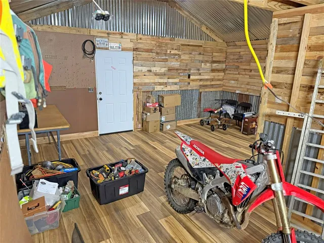 a bedroom with a bed and a desk