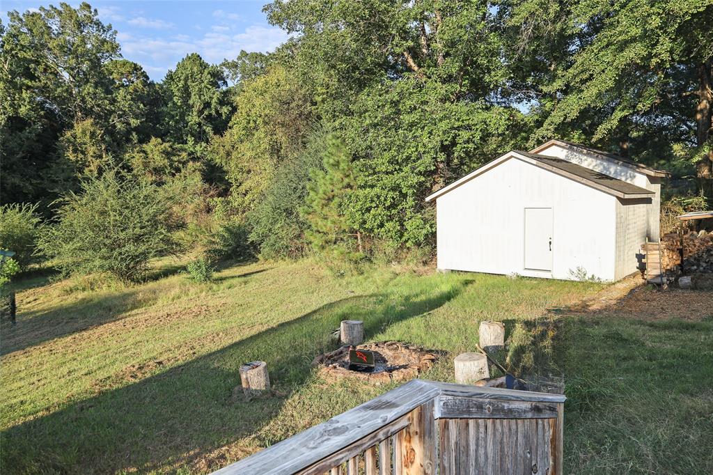 214 Destiny Lane Keatchie, LA 71046 - Photo 38 of 40 a view of a backyard of the house