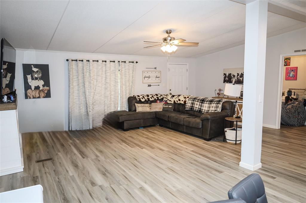 214 Destiny Lane Keatchie, LA 71046 - Photo 7 of 40 a living room with furniture and wooden floor