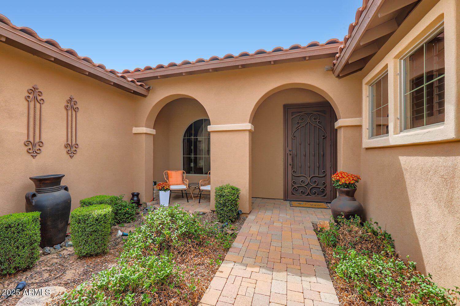 12319 West Eagle Ridge Lane Peoria, AZ 85383 - Photo 13 of 45 Courtyard with Arched Entry