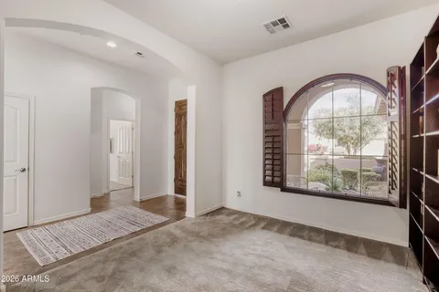 a view of an empty room and window