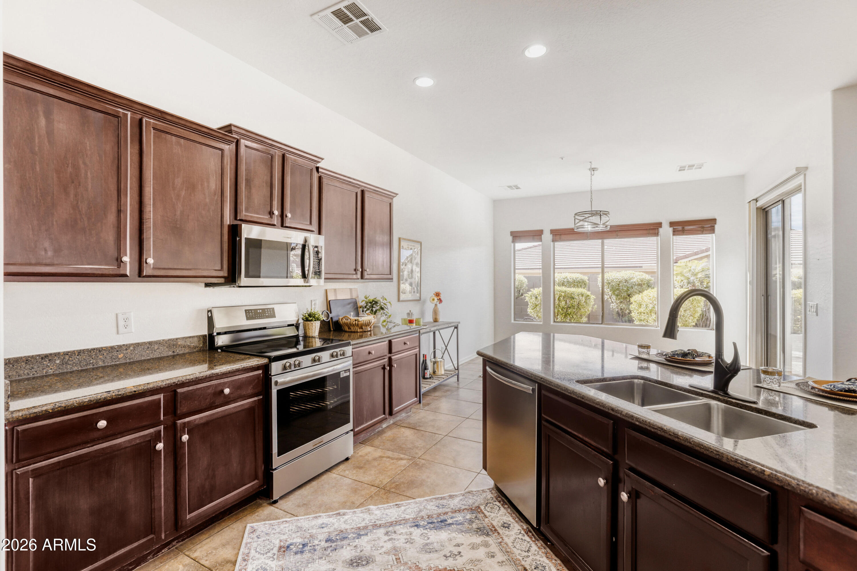 12319 West Eagle Ridge Lane Peoria, AZ 85383 - Photo 16 of 45 Kitchen with Backyard Views