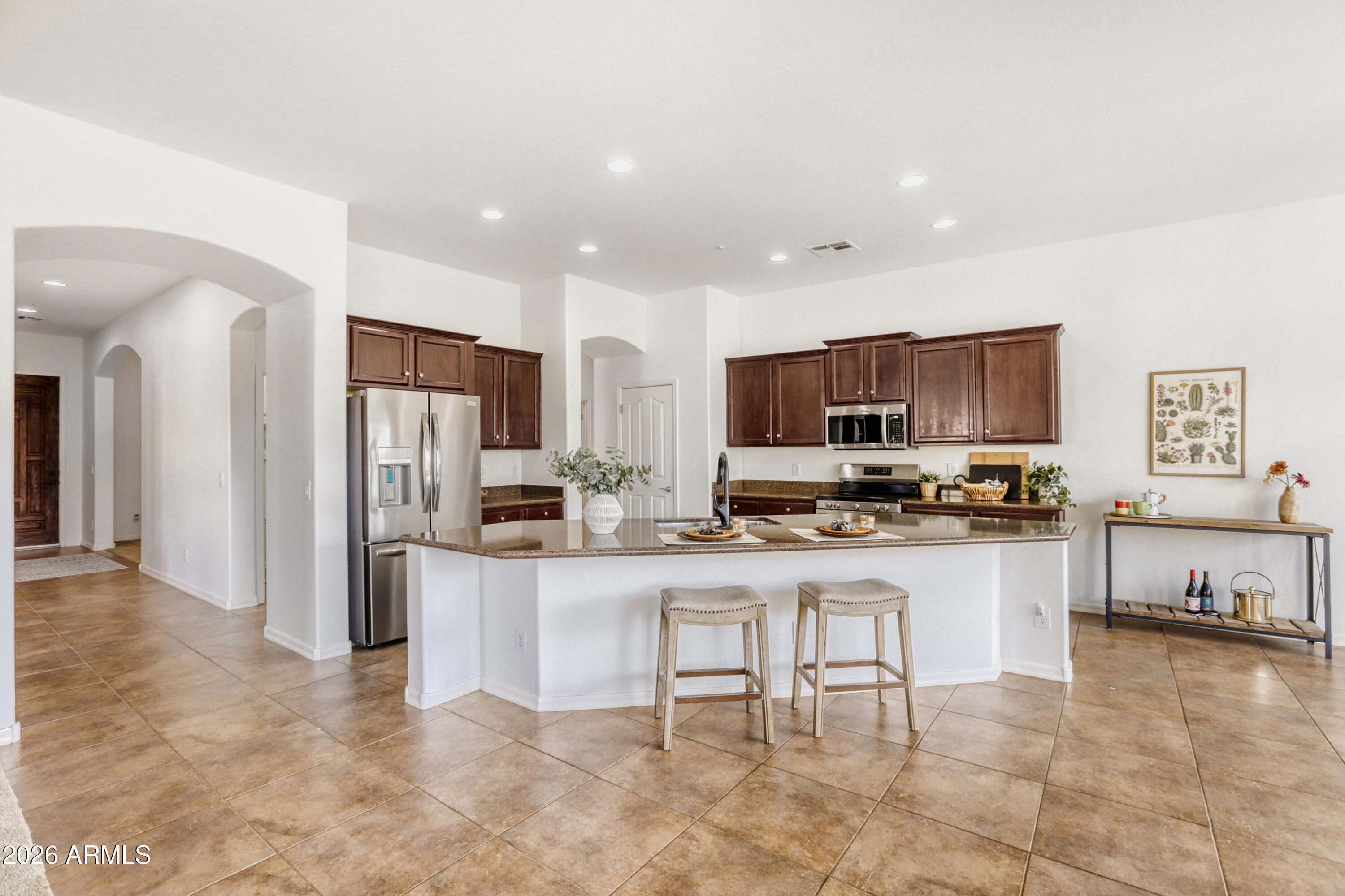 12319 West Eagle Ridge Lane Peoria, AZ 85383 - Photo 9 of 45 Granite Island & Open Layout