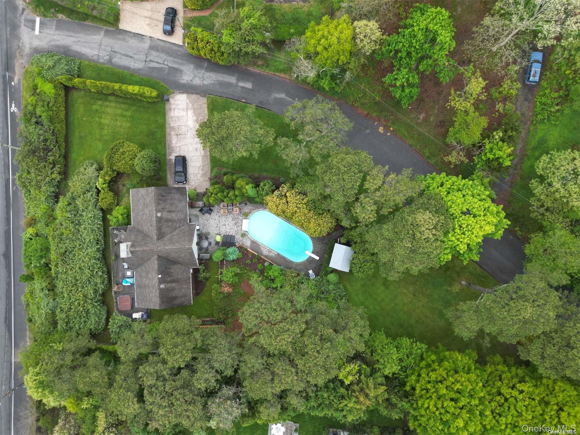 2 West Hillover Road Hampton Bays, NY 11946 - Photo 13 of 42 an aerial view of a house with a yard and plants