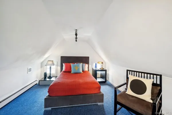 a bedroom with a bed and closet